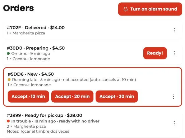 Order list in the Tumbite restaurant dashboard: one order “On time” in green, one “Running late” in yellow not yet accepted, and one “In trouble” in red, ready with no driver.